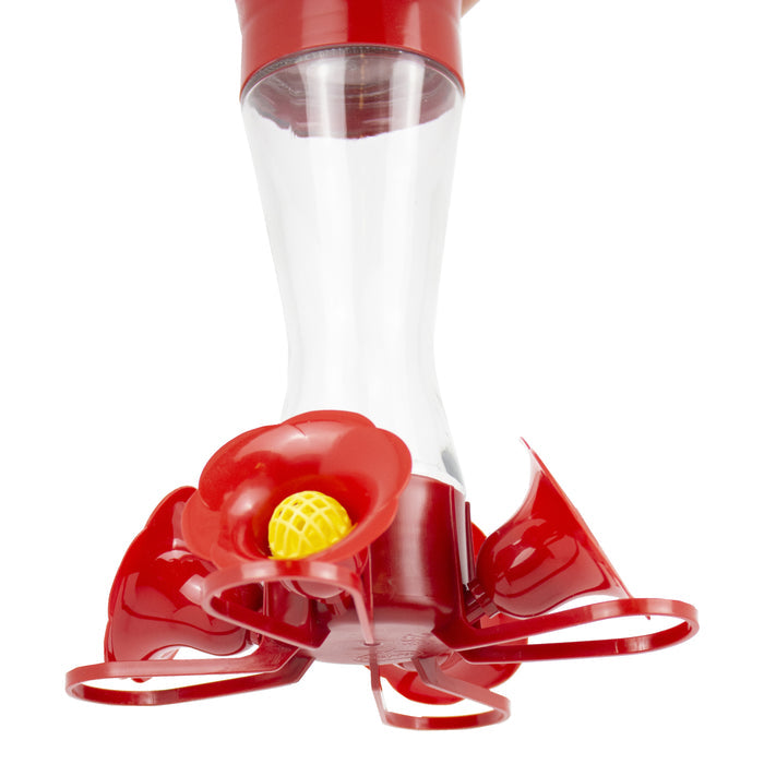 The Glass Sipper Hummingbird Feeder features a clear glass nectar reservoir and red, flower-shaped feeding ports for safe, toxin-free hummingbird feeding.
