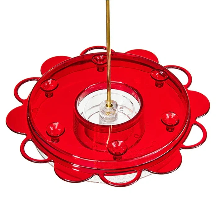 12 oz. Hummerfest Hummingbird Feeder base with six feeding ports and hanging rod, featuring rain overflow, ant moat, and clear basin for nectar visibility.