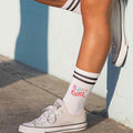 Digitally printed B-Day girl on white socks with black stripes and a gift box for easy gift giving.