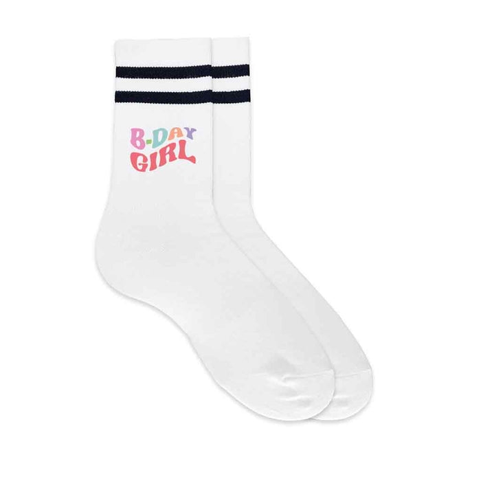 Birthday socks for the birthday girl digitally printed on white socks with black stripes and an easy to use gift box.