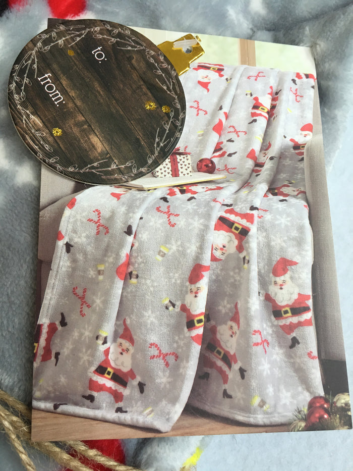Christmas Mistletoe and Co. Dancing Santa and Candy Canes Throw Blanket