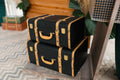 Stacked decorative storage trunks with metal corners