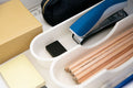 Desk tidy tray holding stationery