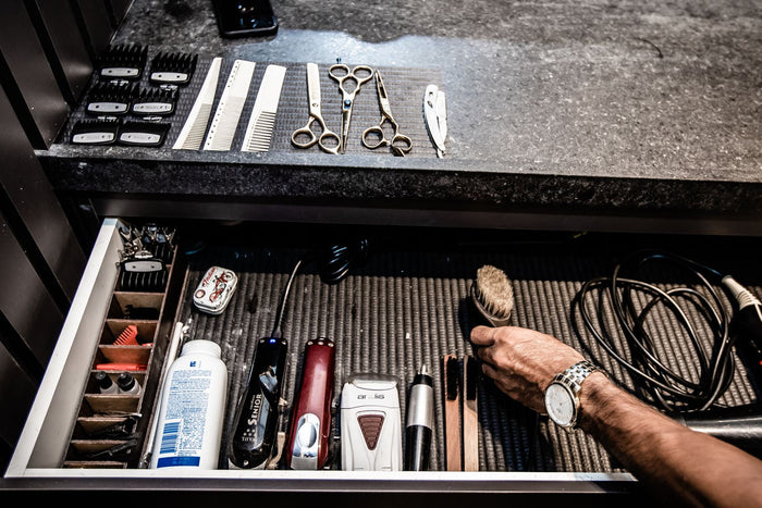 Dark drawer organiser with small items