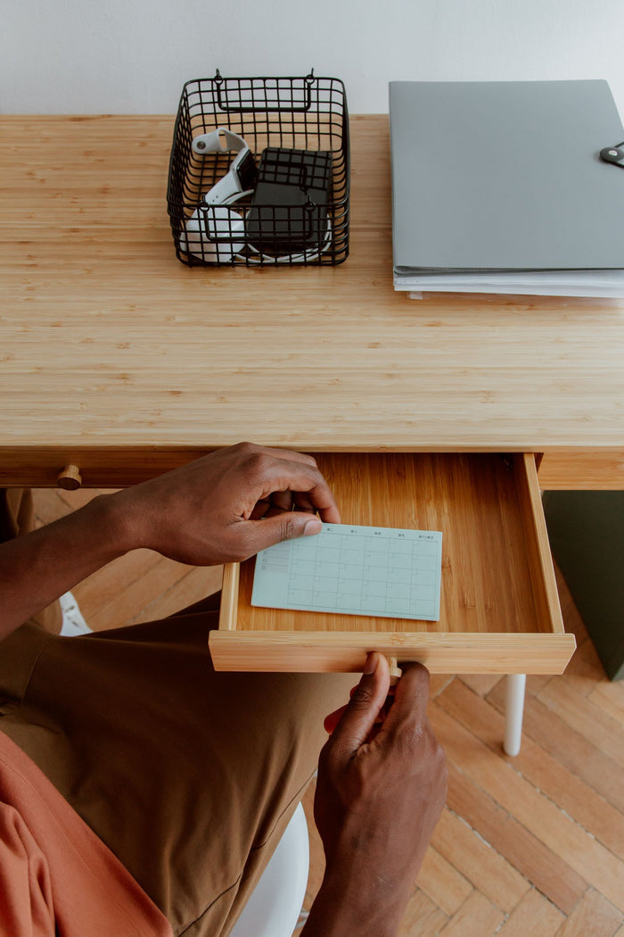 Desk drawer with a tray and small accessories