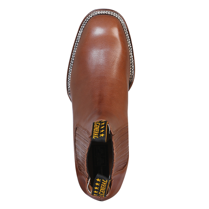Brown leather boot with a brand label