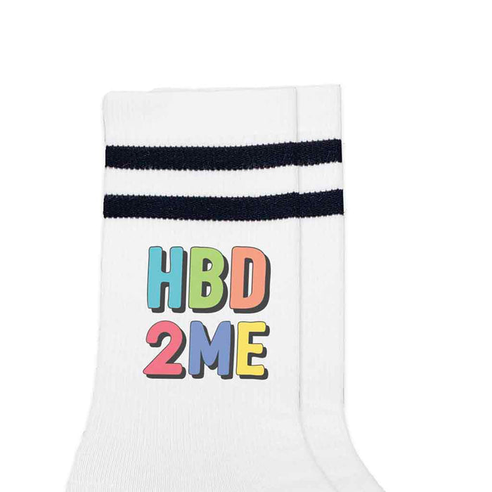 Striped crew socks printed with “Happy Birthday to Me” and eco-friendly gift box