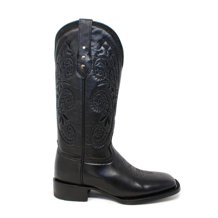 Side view of Artillero women’s cowboy boot – black leather, wide square toe, 12 inch shaft with black floral embroidery, 1.5 inch heel