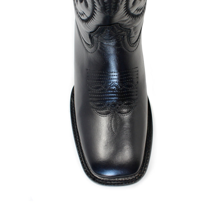 Close-up of square toe on Artillero women’s black leather cowboy boot with detailed stitching