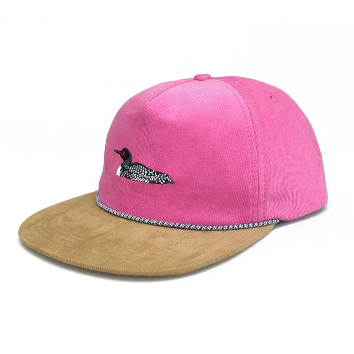 Loon Corduroy Hat, Hot Pink: A five-panel cap with pink crown, tan suede brim, loon embroidery, and black-white cord trim. Adjustable strap included.