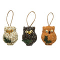 Ollie the Owl, Set of 3: Three owl-shaped bird seed treats with greenery accents and jute loops for hanging, perfect for feeding and attracting birds.