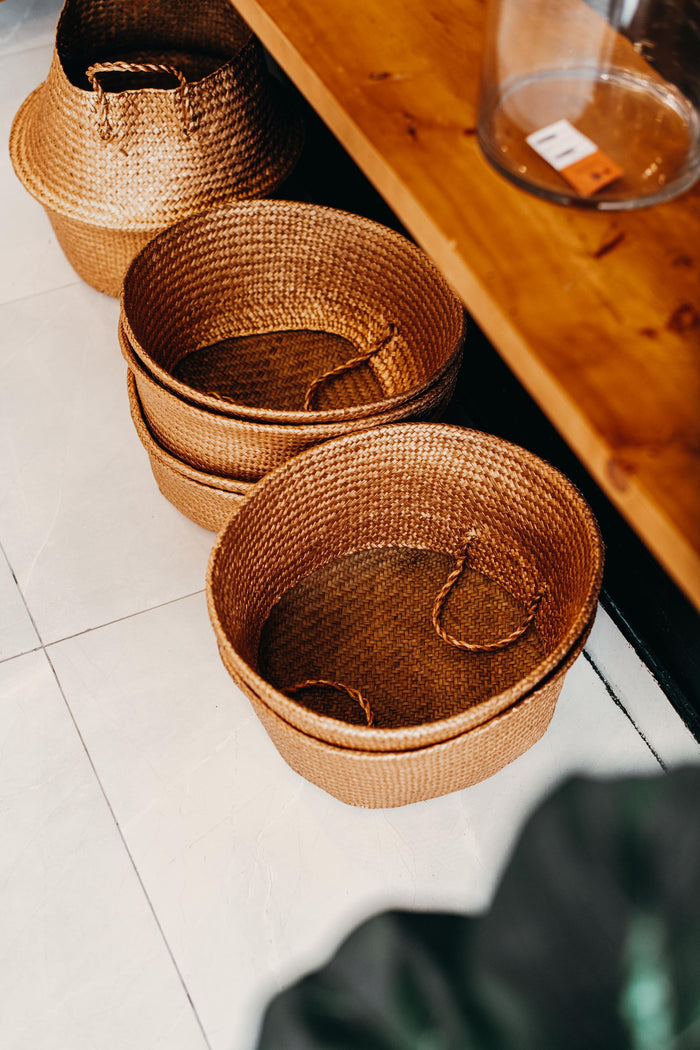 Set of three graduated rattan nesting baskets