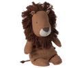Stuffed animal in the shape of a lion sitting