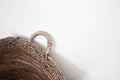 Natural seagrass storage basket with woven side handles