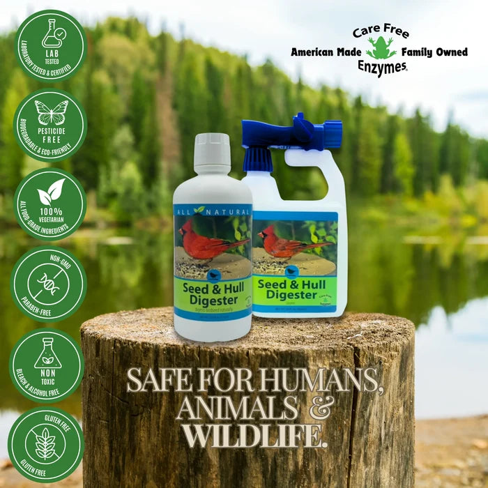 Two white bottles labeled Seed & Hull Digester on a tree stump, surrounded by eco-friendly icons, promoting a safe, all-natural bird feeder cleaning solution.