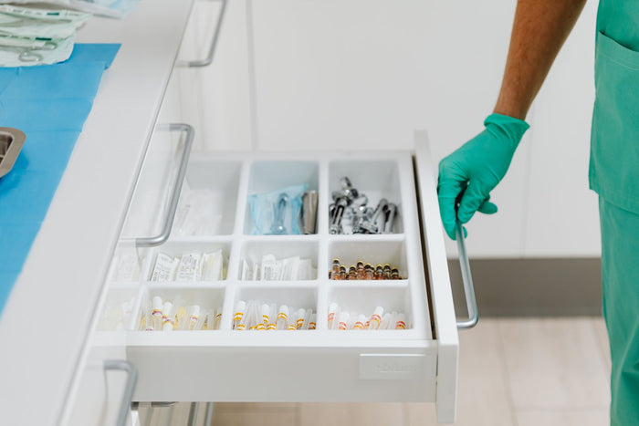 Set of white drawer organiser trays