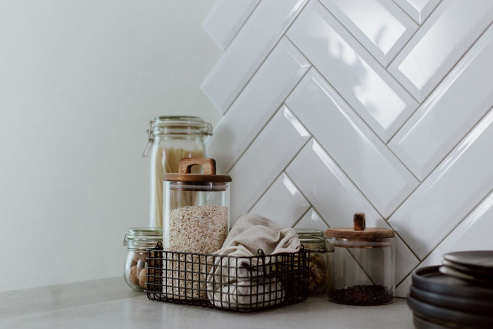 Two wire shelf baskets in a kitchen