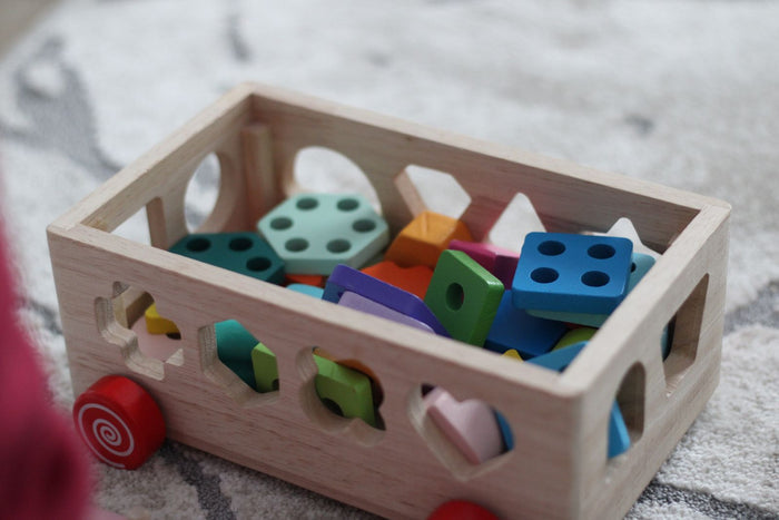Wooden crate holding children's toys
